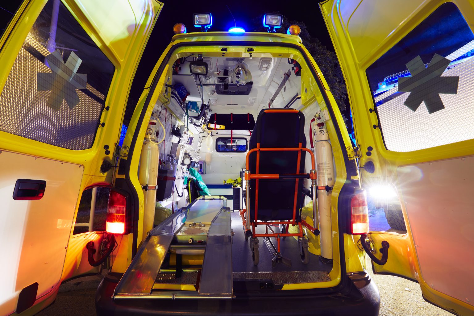 Emergency service - open doors of the ambulance car